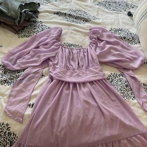 Purple long puff sleeve dress with a tie